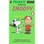 A peanuts book featuring Snoopy (4)